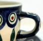 Original-Bunzlauer-Tasse-mit-Untertasse-Dekor-Pfauenauge-Detailansicht